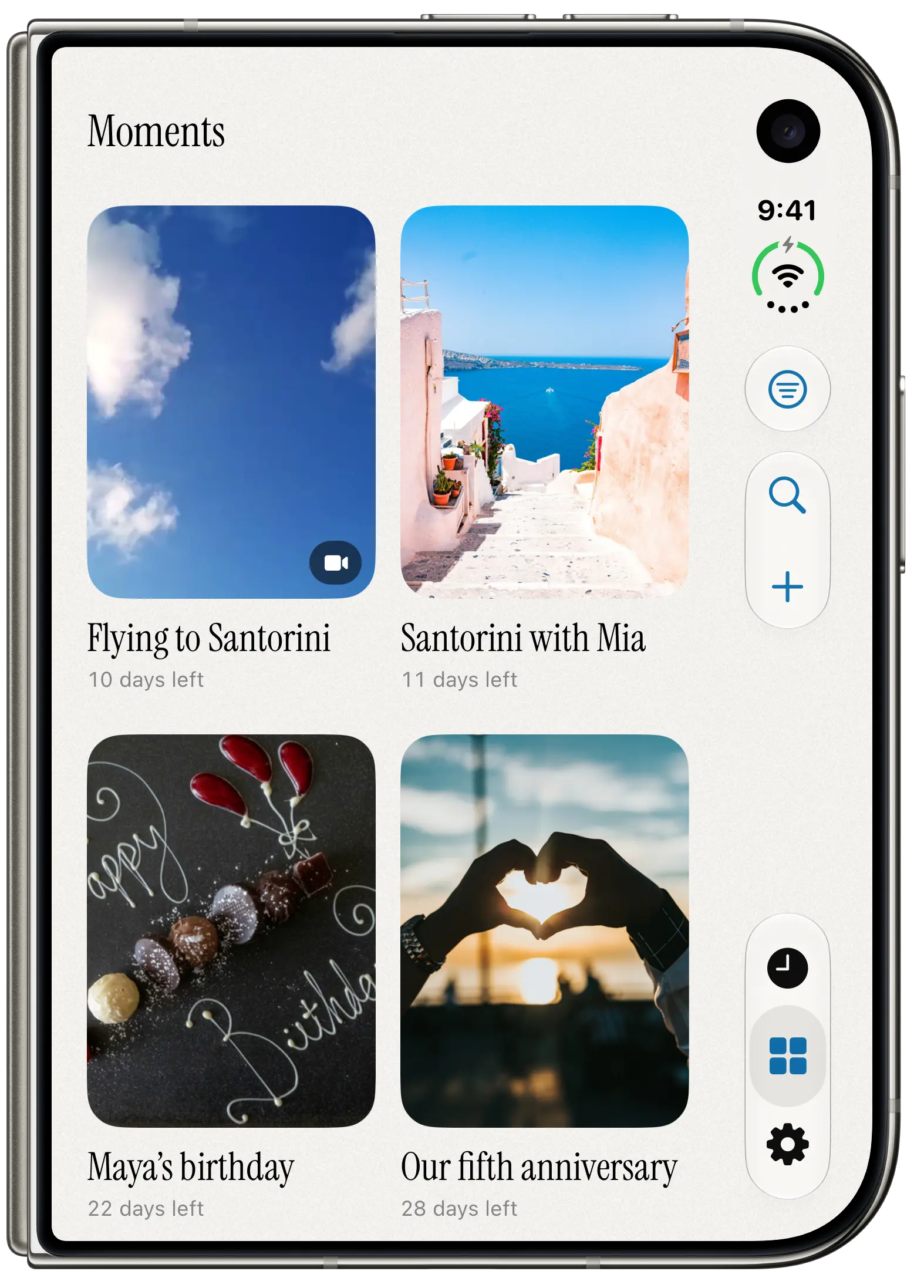 Antici Moments on iPhone Duo, with a trip video, Santorini photo, birthdays, and anniversaries.